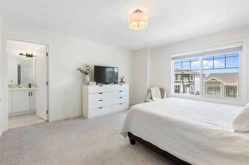 1635 Baywater Street Sw, Airdrie, AB - Indoor Photo Showing Bedroom