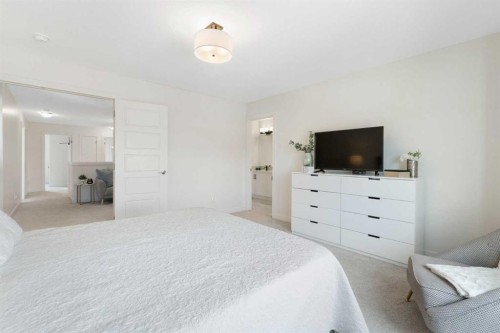 1635 Baywater Street Sw, Airdrie, AB - Indoor Photo Showing Bedroom