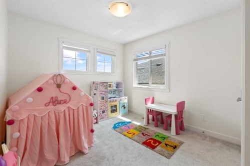 1635 Baywater Street Sw, Airdrie, AB - Indoor Photo Showing Bedroom