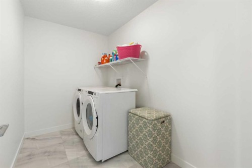 1635 Baywater Street Sw, Airdrie, AB - Indoor Photo Showing Laundry Room