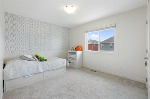 1635 Baywater Street Sw, Airdrie, AB - Indoor Photo Showing Bedroom