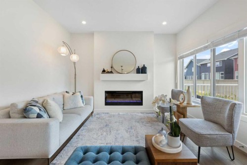 1635 Baywater Street Sw, Airdrie, AB - Indoor Photo Showing Living Room With Fireplace