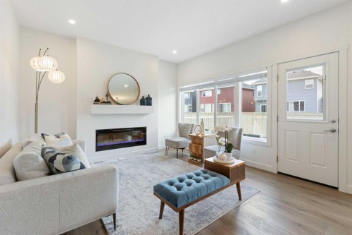 1635 Baywater Street Sw, Airdrie, AB - Indoor Photo Showing Living Room With Fireplace