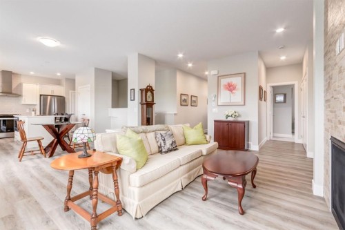 220-20 Silverado Crest Park Sw, Calgary, AB - Indoor Photo Showing Living Room