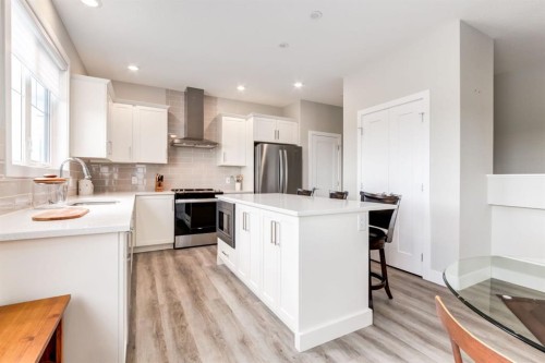 220-20 Silverado Crest Park Sw, Calgary, AB - Indoor Photo Showing Kitchen With Upgraded Kitchen