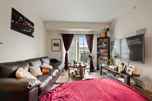4414-99 Copperstone Park Se, Calgary, AB - Indoor Photo Showing Living Room