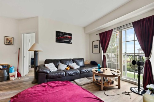 4414-99 Copperstone Park Se, Calgary, AB - Indoor Photo Showing Living Room