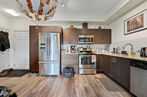 4414-99 Copperstone Park Se, Calgary, AB - Indoor Photo Showing Kitchen With Double Sink