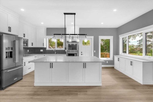 2016 30 Avenue, Nanton, AB - Indoor Photo Showing Kitchen With Upgraded Kitchen