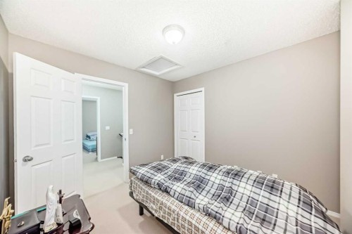 135 Copperstone Grove Se, Calgary, AB - Indoor Photo Showing Bedroom