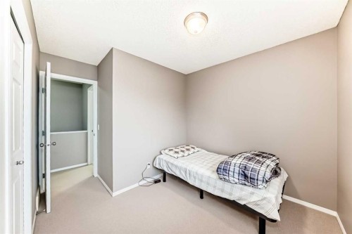 135 Copperstone Grove Se, Calgary, AB - Indoor Photo Showing Bedroom
