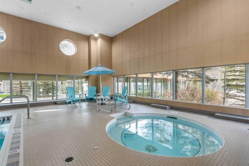 2005-77 Spruce Place Sw, Calgary, AB - Indoor Photo Showing Other Room With In Ground Pool