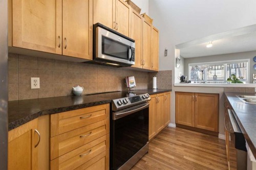 57 Auburn Bay View Se, Calgary, AB - Indoor Photo Showing Kitchen With Double Sink