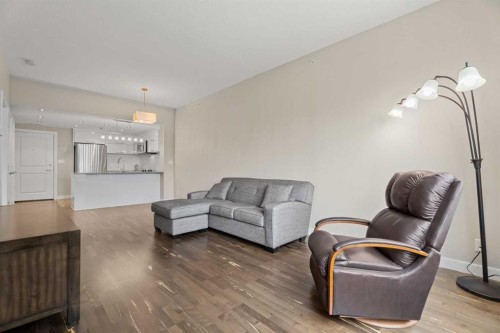 308-1110 3 Avenue Nw, Calgary, AB - Indoor Photo Showing Living Room