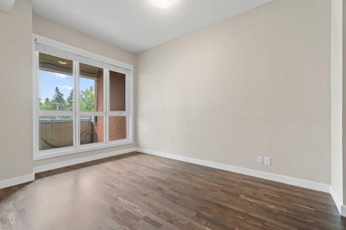 308-1110 3 Avenue Nw, Calgary, AB - Indoor Photo Showing Other Room