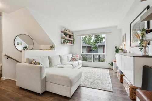 41-6915 Ranchview Drive Nw, Calgary, AB - Indoor Photo Showing Living Room With Fireplace