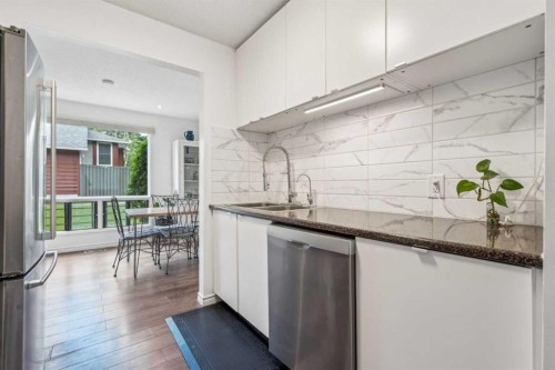 41-6915 Ranchview Drive Nw, Calgary, AB - Indoor Photo Showing Kitchen With Double Sink