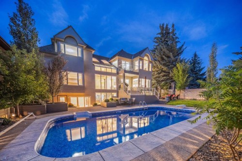 42 Woodhaven Crescent Sw, Calgary, AB - Outdoor With In Ground Pool With Backyard