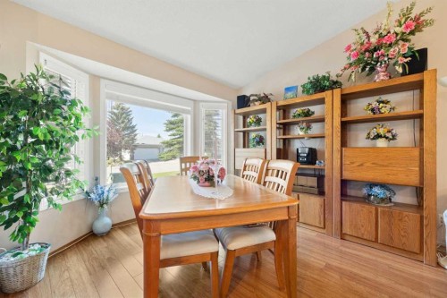 217 Arbour Cliff Close Nw, Calgary, AB - Indoor Photo Showing Dining Room