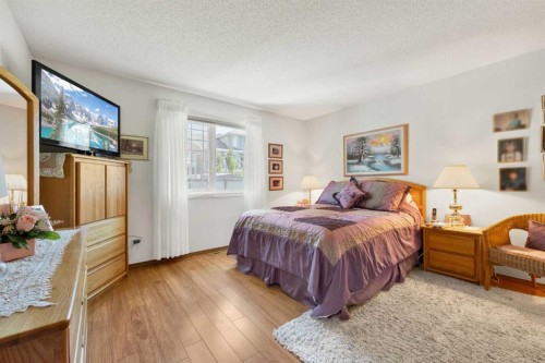 217 Arbour Cliff Close Nw, Calgary, AB - Indoor Photo Showing Bedroom