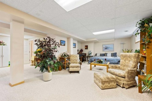 217 Arbour Cliff Close Nw, Calgary, AB - Indoor Photo Showing Basement