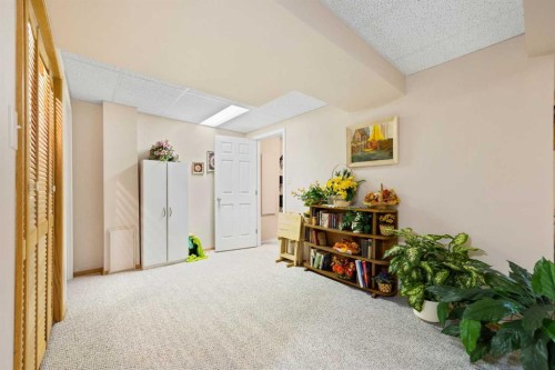 217 Arbour Cliff Close Nw, Calgary, AB - Indoor Photo Showing Other Room
