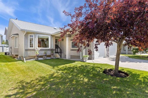 217 Arbour Cliff Close Nw, Calgary, AB - Outdoor With Facade