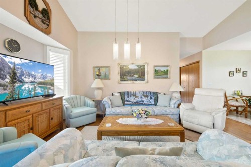 217 Arbour Cliff Close Nw, Calgary, AB - Indoor Photo Showing Living Room