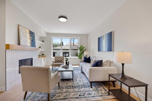 7929 47 Avenue Nw, Calgary, AB - Indoor Photo Showing Living Room With Fireplace