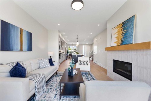7929 47 Avenue Nw, Calgary, AB - Indoor Photo Showing Living Room With Fireplace