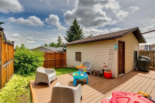24 Millcrest Road Sw, Calgary, AB - Outdoor With Deck Patio Veranda With Exterior
