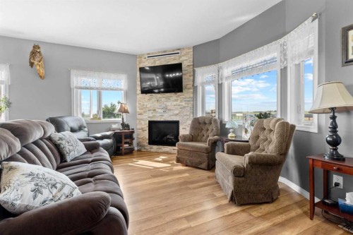 27138 Highway 27 Highway, Rural Mountain View County, AB - Indoor Photo Showing Living Room With Fireplace