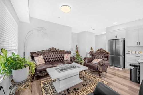 1211-19489 Main Street Se, Calgary, AB - Indoor Photo Showing Living Room