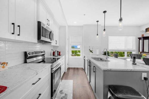 1211-19489 Main Street Se, Calgary, AB - Indoor Photo Showing Kitchen With Double Sink With Upgraded Kitchen
