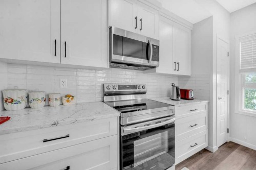 1211-19489 Main Street Se, Calgary, AB - Indoor Photo Showing Kitchen With Upgraded Kitchen