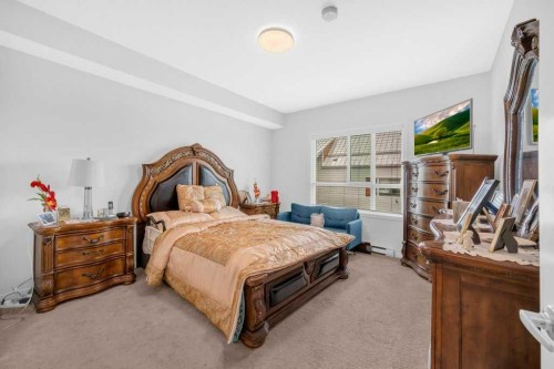 1211-19489 Main Street Se, Calgary, AB - Indoor Photo Showing Bedroom