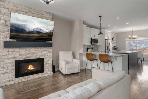 228 Ravenstern Crescent Se, Airdrie, AB - Indoor Photo Showing Living Room With Fireplace