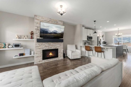 228 Ravenstern Crescent Se, Airdrie, AB - Indoor Photo Showing Living Room With Fireplace