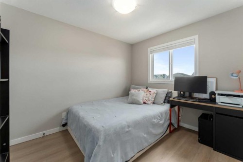 228 Ravenstern Crescent Se, Airdrie, AB - Indoor Photo Showing Bedroom