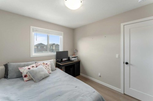 228 Ravenstern Crescent Se, Airdrie, AB - Indoor Photo Showing Bedroom