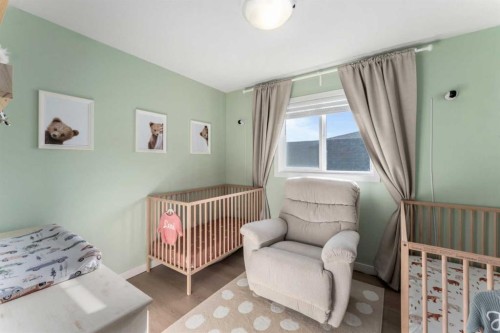 228 Ravenstern Crescent Se, Airdrie, AB - Indoor Photo Showing Bedroom