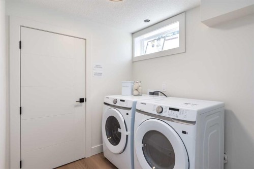 15 Hoover Place Sw, Calgary, AB - Indoor Photo Showing Laundry Room