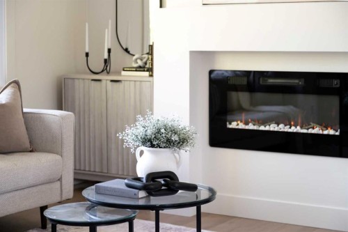 15 Hoover Place Sw, Calgary, AB - Indoor With Fireplace