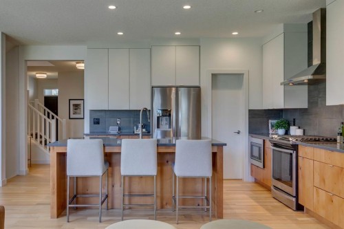 69 Shawnee Green Sw, Calgary, AB - Indoor Photo Showing Kitchen With Stainless Steel Kitchen With Upgraded Kitchen