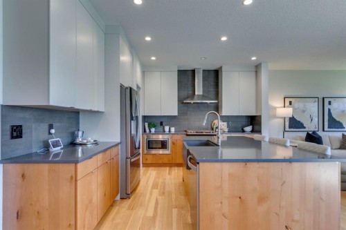 69 Shawnee Green Sw, Calgary, AB - Indoor Photo Showing Kitchen With Stainless Steel Kitchen With Upgraded Kitchen