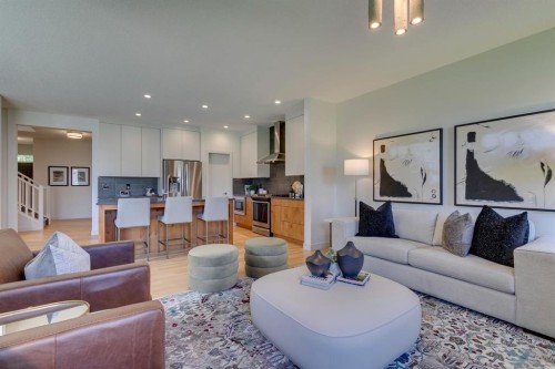 69 Shawnee Green Sw, Calgary, AB - Indoor Photo Showing Living Room