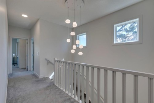 69 Shawnee Green Sw, Calgary, AB - Indoor Photo Showing Other Room