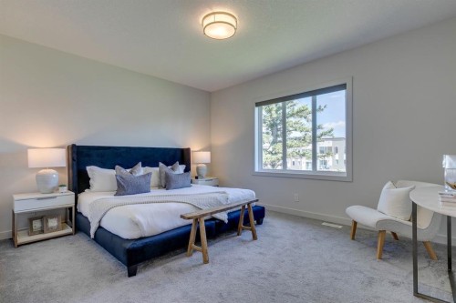 69 Shawnee Green Sw, Calgary, AB - Indoor Photo Showing Bedroom