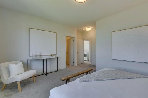69 Shawnee Green Sw, Calgary, AB - Indoor Photo Showing Bedroom