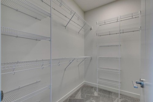 69 Shawnee Green Sw, Calgary, AB - Indoor With Storage